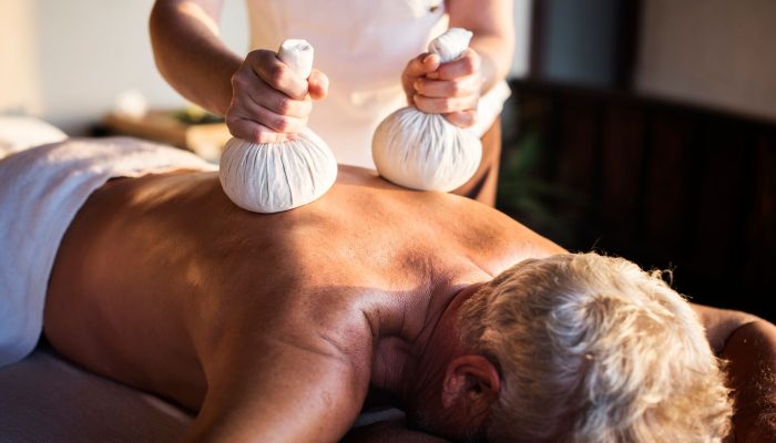 massage-therapist-massaging-at-a-spa-QL8DYX4 (1)